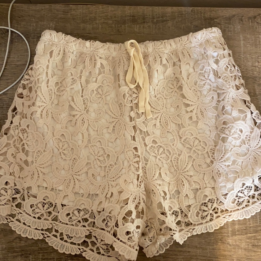 Nude lace shorts. Size M. Never worn!!